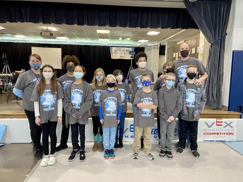 HOB robotics team members include (l-r) coach Cathy Ward, Eva Taylor, Mason Fountain, Sophia Winkfield, Avery Harp, Amelia Kennedy, Ashlyn Berlinger, Geremiah Curtis, Jace Weatherspoon, Matthew Foreman, Owen Morris, Ethan Schirmer and coach Mark Morey. Milton teams dominated regional competition Feb. 26.